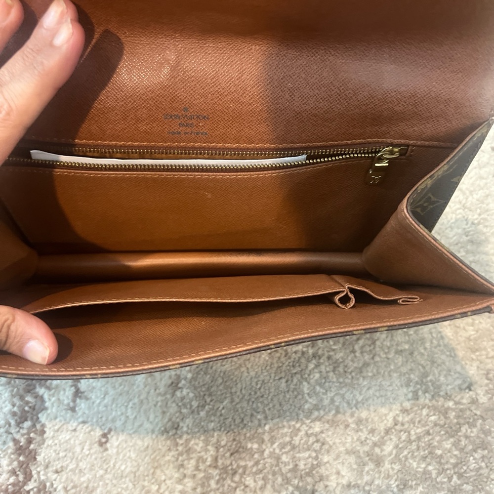 Louie Vuitton clutch bag